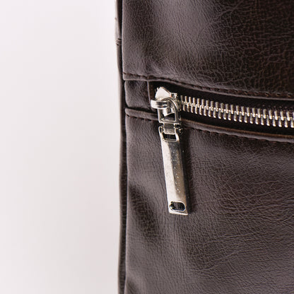 Sac à dos en cuir marron noirci
Référence : 6601