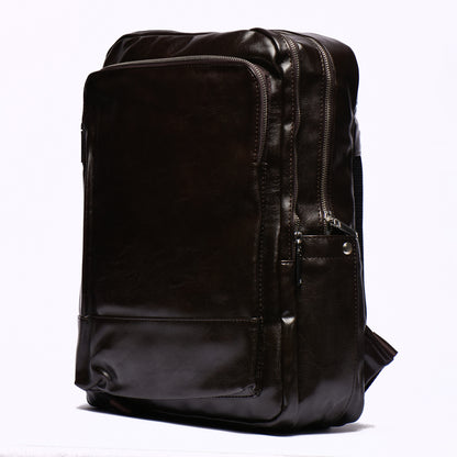 Sac à dos en cuir marron noirci avec multiples compartiments