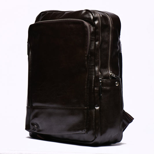 Sac à dos en cuir marron noirci avec multiples compartiments